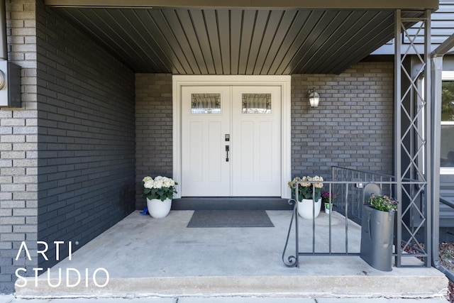 3116 N River Dr E, Eden, UT 84310 - entrance to property with brick siding and covered porch