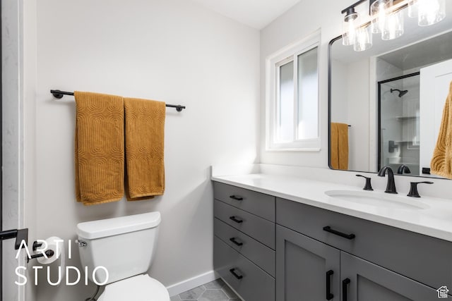 3116 N River Dr E, Eden, UT 84310 - bathroom featuring vanity, baseboards, toilet, an enclosed shower, and tile patterned flooring