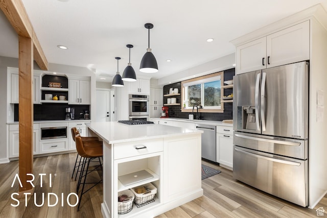 3116 N River Dr E, Eden, UT 84310 - kitchen with open shelves, backsplash, and stainless steel appliances