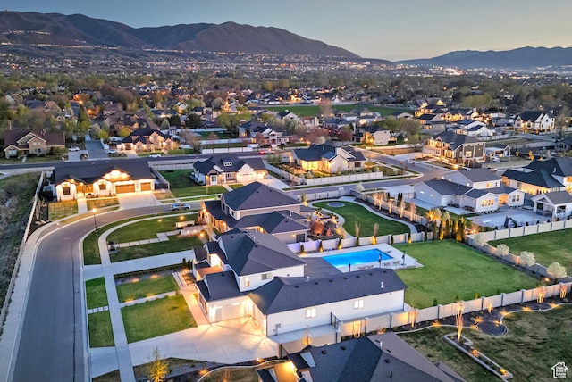 birds eye view of property featuring a residential view and a mountain view