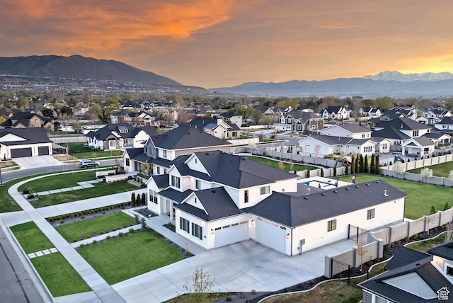 birds eye view of property featuring a residential view and a mountain view
