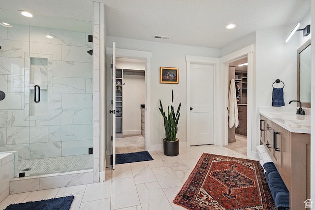 full bathroom featuring recessed lighting, a shower stall, marble finish floor, visible vents, and vanity