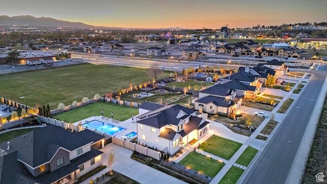 aerial view at dusk with a mountain view