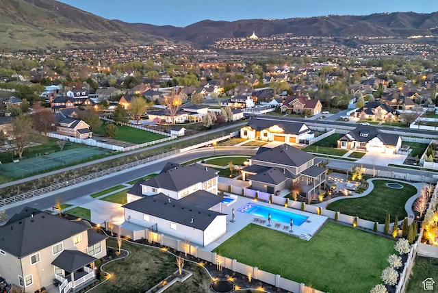 birds eye view of property with a residential view and a mountain view