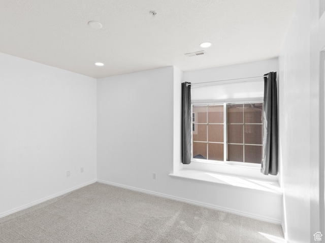 6939 S Tourist Ln W Unit 2C, West Jordan, UT 84084 - spare room featuring recessed lighting, carpet floors, visible vents, and baseboards
