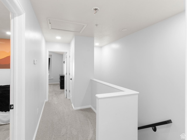 6939 S Tourist Ln W Unit 2C, West Jordan, UT 84081 - hallway featuring an upstairs landing, light colored carpet, baseboards, and recessed lighting