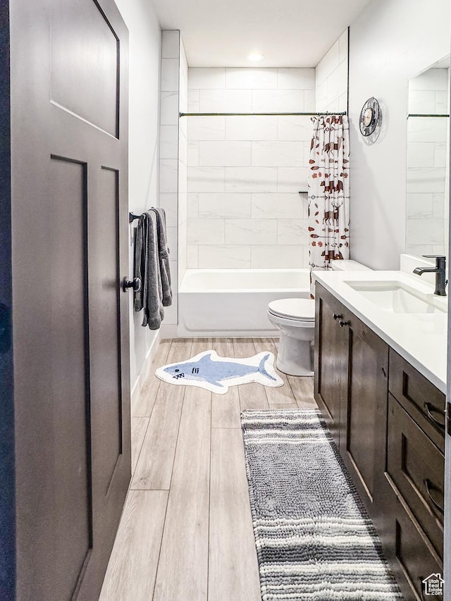1678 S Ridgeline Dr Unit 1276, Heber City, UT 84032 - full bath featuring wood finished floors, vanity, toilet, and shower / tub combo with curtain