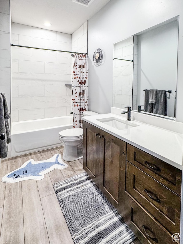 1678 S Ridgeline Dr Unit 1276, Heber City, UT 84032 - full bathroom with wood finished floors, visible vents, toilet, vanity, and shower / bath combo