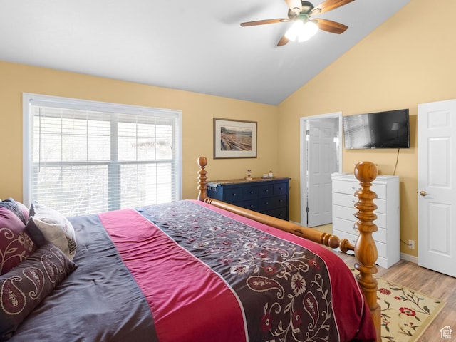 1004 Uri Ln, Midway, UT 84049 - bedroom with lofted ceiling, a ceiling fan, and wood finished floors