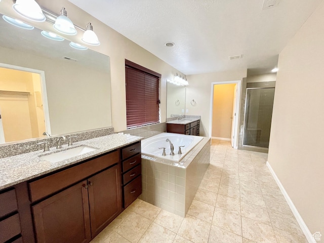 3859 W Young Lucerne Cir, Riverton, UT 84065 - bathroom with a garden tub, a sink, visible vents, and a stall shower