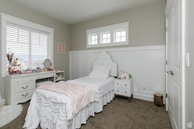 535 N Pheasant Hollow Ln, Mendon, UT 84325 - bedroom featuring wainscoting, carpet floors, and a decorative wall