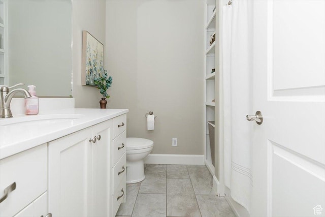 535 N Pheasant Hollow Ln, Mendon, UT 84325 - bathroom with baseboards, toilet, and vanity