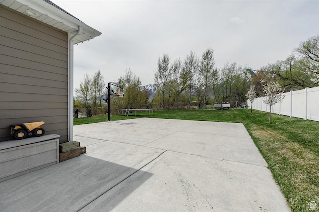 535 N Pheasant Hollow Ln, Mendon, UT 84325 - view of basketball court featuring fence, a yard, and basketball court