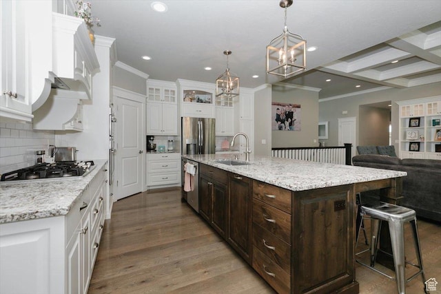535 N Pheasant Hollow Ln, Mendon, UT 84325 - kitchen featuring white cabinets, a sink, appliances with stainless steel finishes, and tasteful backsplash