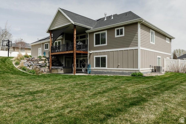 535 N Pheasant Hollow Ln, Mendon, UT 84325 - rear view of property with central AC unit, a balcony, a yard, board and batten siding, and a hot tub