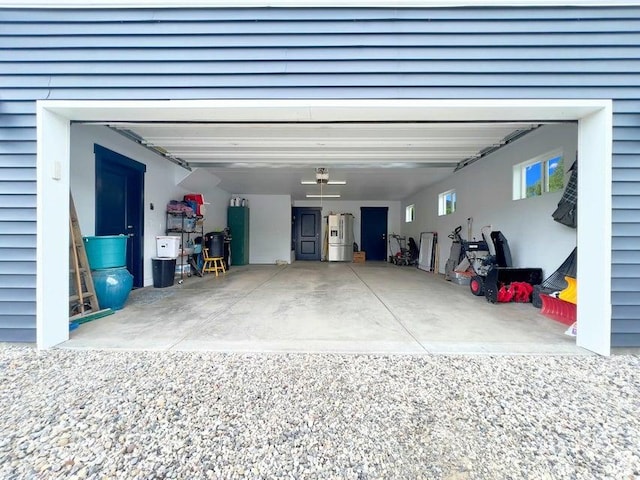 174 S 200 E, Pine Valley, UT 84781 - garage featuring water heater and stainless steel fridge