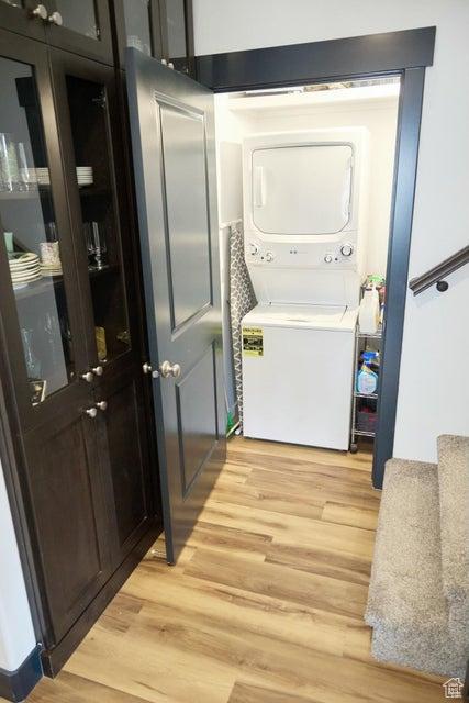 174 S 200 E, Pine Valley, UT 84781 - laundry room with light wood-type flooring and stacked washer and clothes dryer
