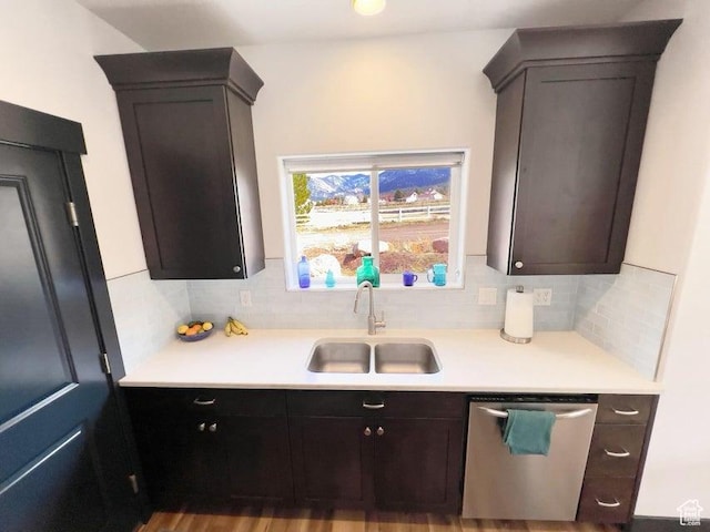 174 S 200 E, Pine Valley, UT 84781 - kitchen with stainless steel dishwasher, a sink, decorative backsplash, dark brown cabinetry, and light countertops