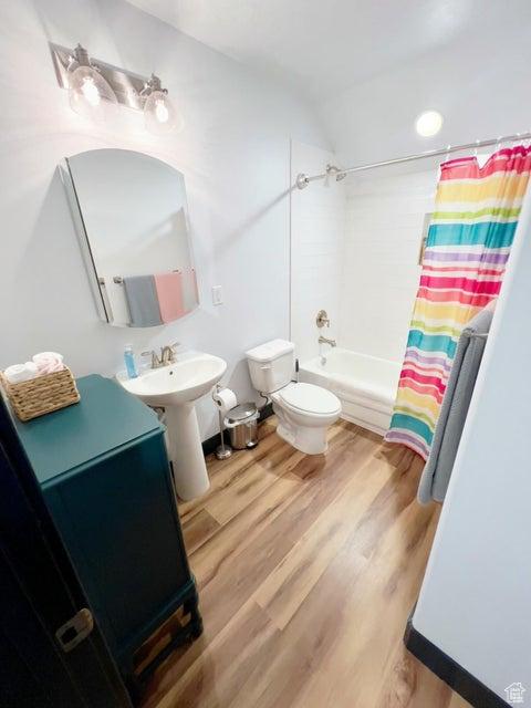 174 S 200 E, Pine Valley, UT 84781 - full bath featuring lofted ceiling, wood finished floors, a sink, and toilet