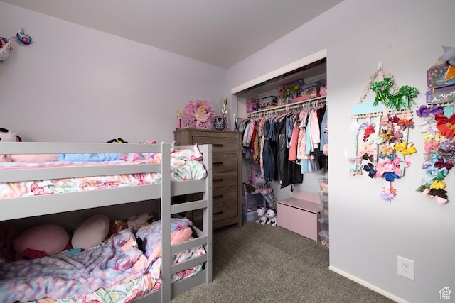 carpeted bedroom with a closet