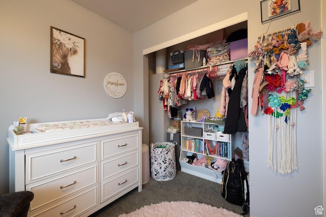 bedroom with carpet floors and a closet