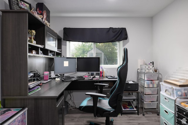 office space featuring wood finished floors