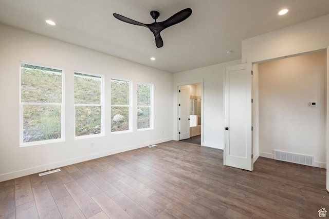 495 W Ascent Dr, Hideout, UT 84036 - unfurnished bedroom featuring baseboards, wood finished floors, and visible vents