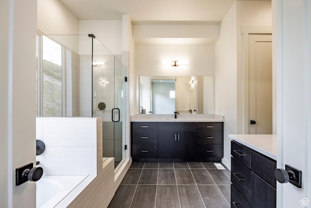 495 W Ascent Dr, Hideout, UT 84036 - bathroom featuring a tub to relax in, baseboards, vanity, and a stall shower