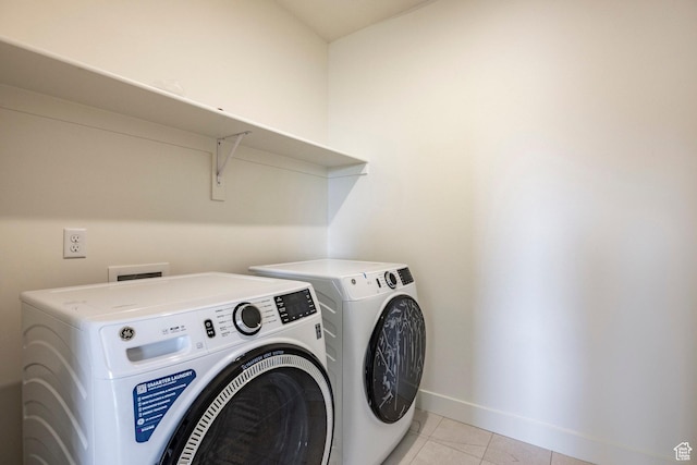 495 W Ascent Dr, Hideout, UT 84036 - washroom featuring washer and dryer, baseboards, laundry area, and light tile patterned floors