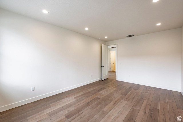 495 W Ascent Dr, Hideout, UT 84036 - spare room with recessed lighting, hardwood / wood-style floors, visible vents, and baseboards