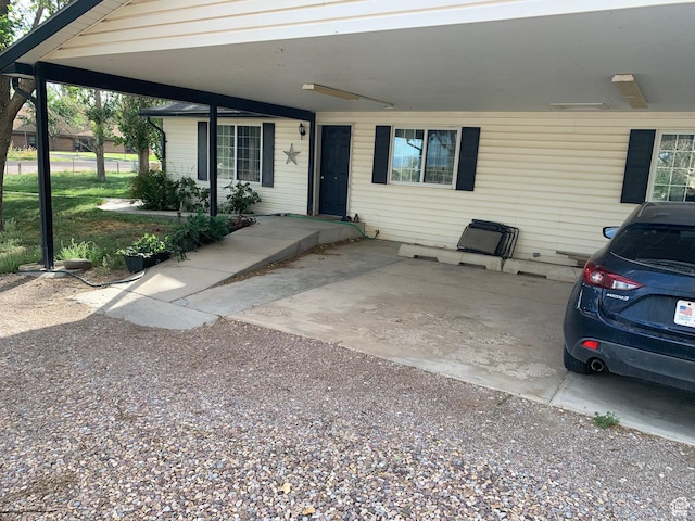 exterior space featuring an attached carport
