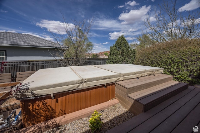 3270 E Rim Vistas Cir, Moab, UT 84532 - wooden terrace featuring a covered hot tub and fence