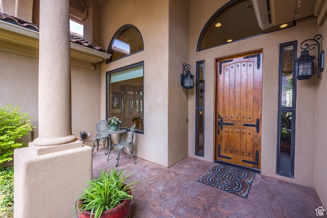 3270 E Rim Vistas Cir, Moab, UT 84532 - entrance to property with a tiled roof and stucco siding
