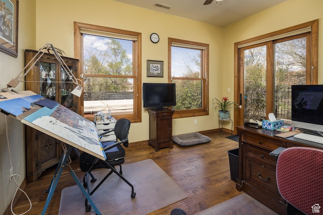 3270 E Rim Vistas Cir, Moab, UT 84532 - office featuring a healthy amount of sunlight, dark wood-type flooring, and visible vents