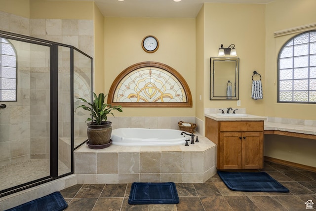 3270 E Rim Vistas Cir, Moab, UT 84532 - full bath with a garden tub, vanity, and a shower stall