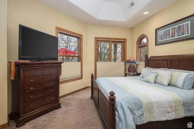 3270 E Rim Vistas Cir, Moab, UT 84532 - bedroom featuring a skylight, baseboards, visible vents, and light colored carpet