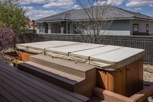 3270 E Rim Vistas Cir, Moab, UT 84532 - wooden terrace with a covered hot tub and fence