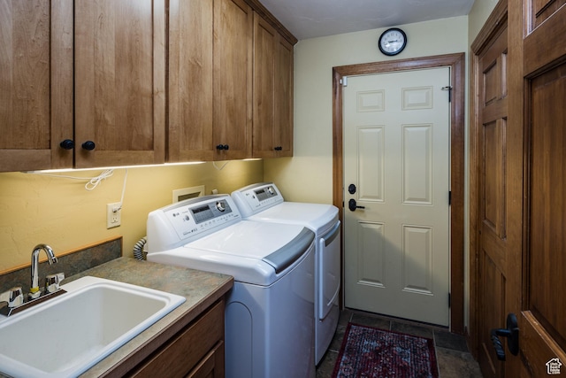 3270 E Rim Vistas Cir, Moab, UT 84532 - laundry area featuring cabinet space, washer and clothes dryer, and a sink