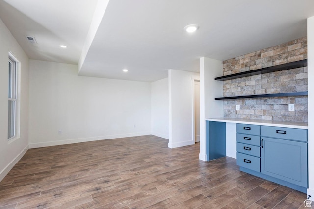 bar featuring recessed lighting, wood finished floors, visible vents, and baseboards