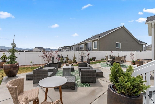 6079 W Teton Village Dr Unit 106, Herriman, UT 84096 - view of patio with outdoor dining area, a fenced backyard, and an outdoor living space