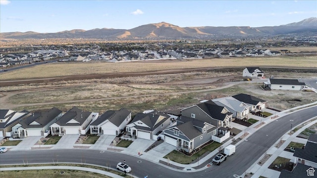 6079 W Teton Village Dr Unit 106, Herriman, UT 84096 - birds eye view of property with a mountain view and a residential view