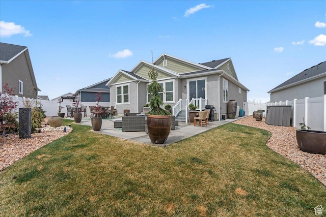 6079 W Teton Village Dr Unit 106, Herriman, UT 84096 - rear view of house featuring a patio area, a fenced backyard, and a yard