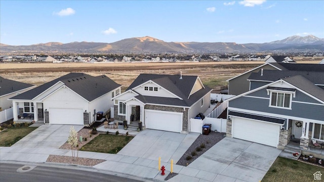 6079 W Teton Village Dr Unit 106, Herriman, UT 84096 - ranch-style house featuring driveway, stone siding, and fence