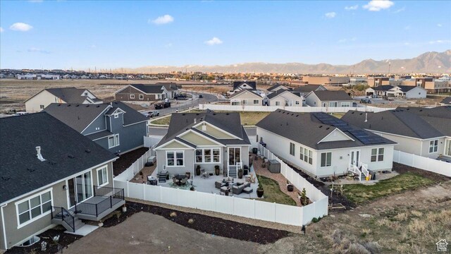 6079 W Teton Village Dr Unit 106, Herriman, UT 84096 - aerial view featuring a mountain view and a residential view