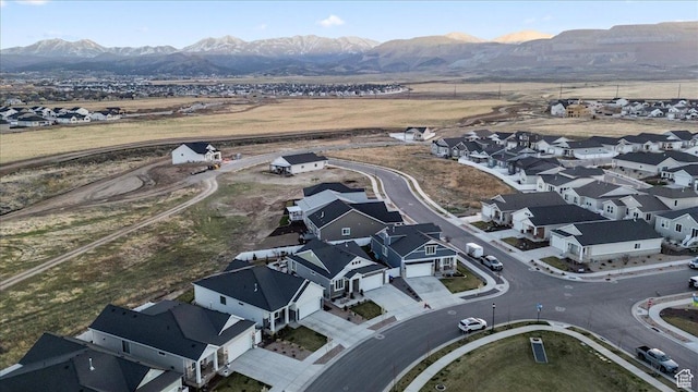 6079 W Teton Village Dr Unit 106, Herriman, UT 84096 - aerial view featuring a mountain view and a residential view