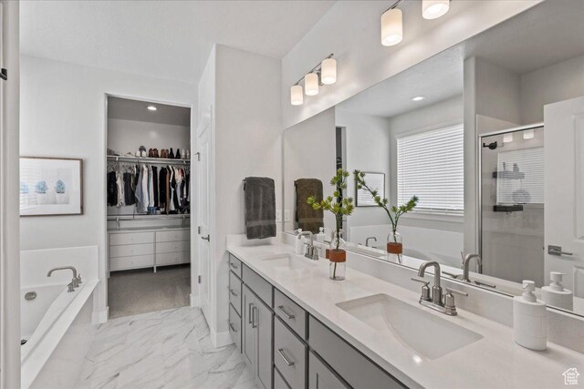 6079 W Teton Village Dr Unit 106, Herriman, UT 84096 - full bath featuring marble finish floor, a garden tub, a sink, and double vanity
