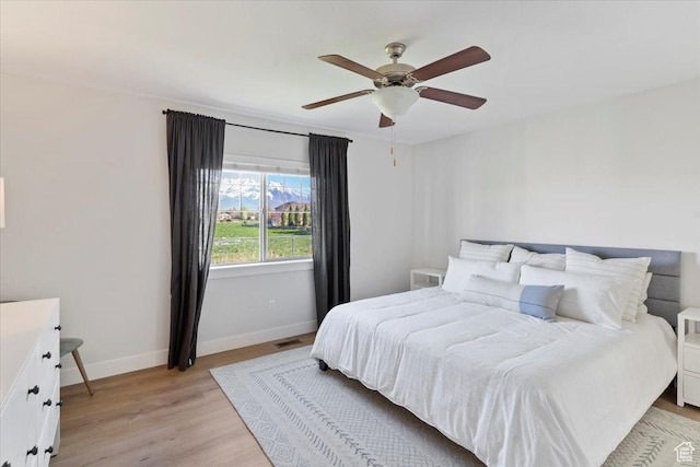 2292 W 440 S, Provo, UT 84601 - bedroom featuring ceiling fan, baseboards, visible vents, and light wood-style flooring