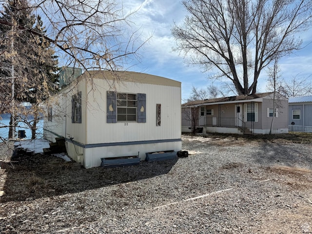 2904 S Edgemont Dr, Garden City, UT 84028 - view of property exterior featuring a porch