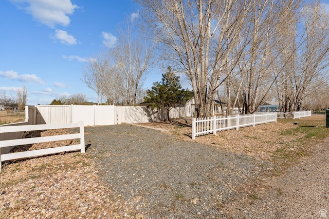 view of yard featuring fence