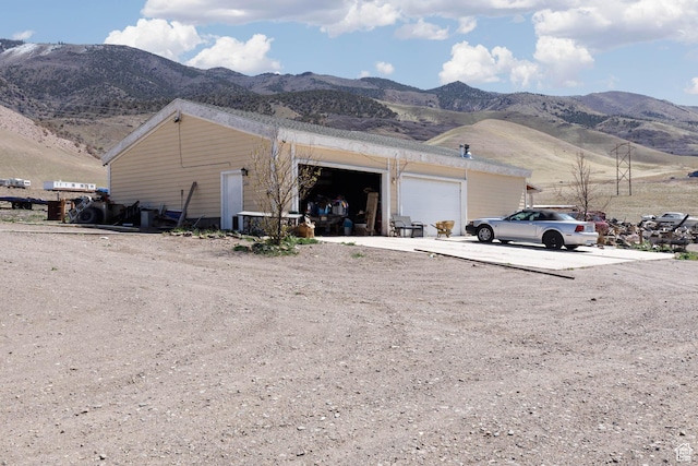 3001 S 600 W, Monroe, UT 84754 - exterior space with an attached garage, driveway, and a mountain view